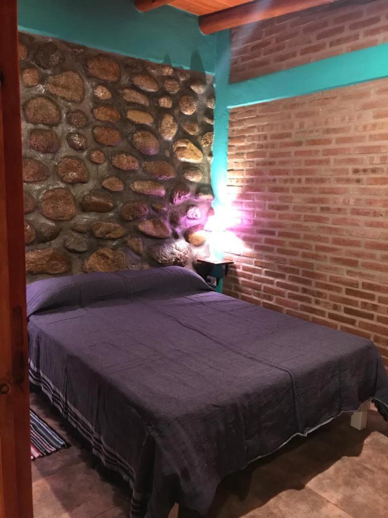 Departamentos La Familia Nono Apartment Стая снимка